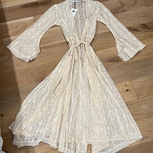 Beautiful lace duster. Never worn